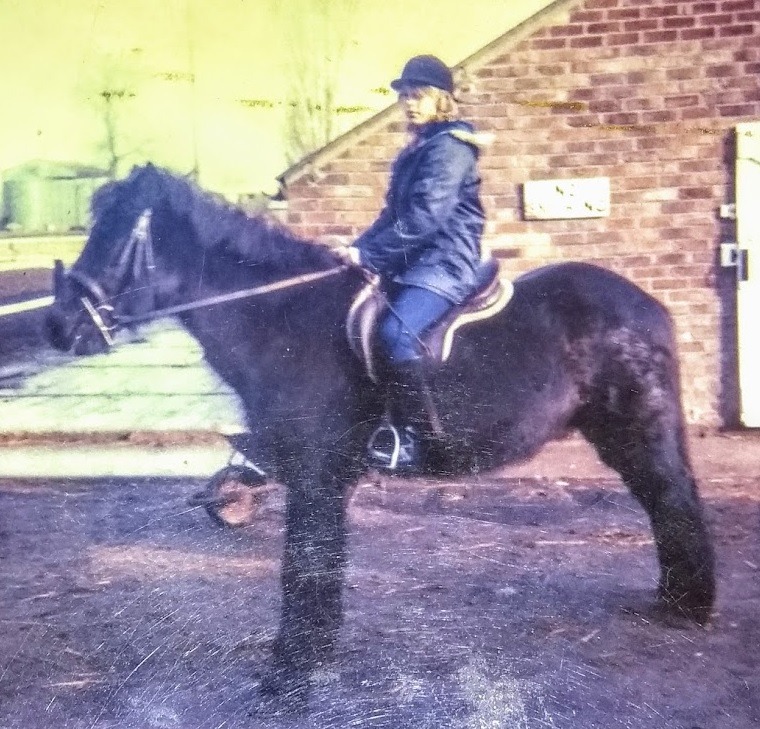 Equestrian web designer Angela D Taylor riding a pony in the early 1980s